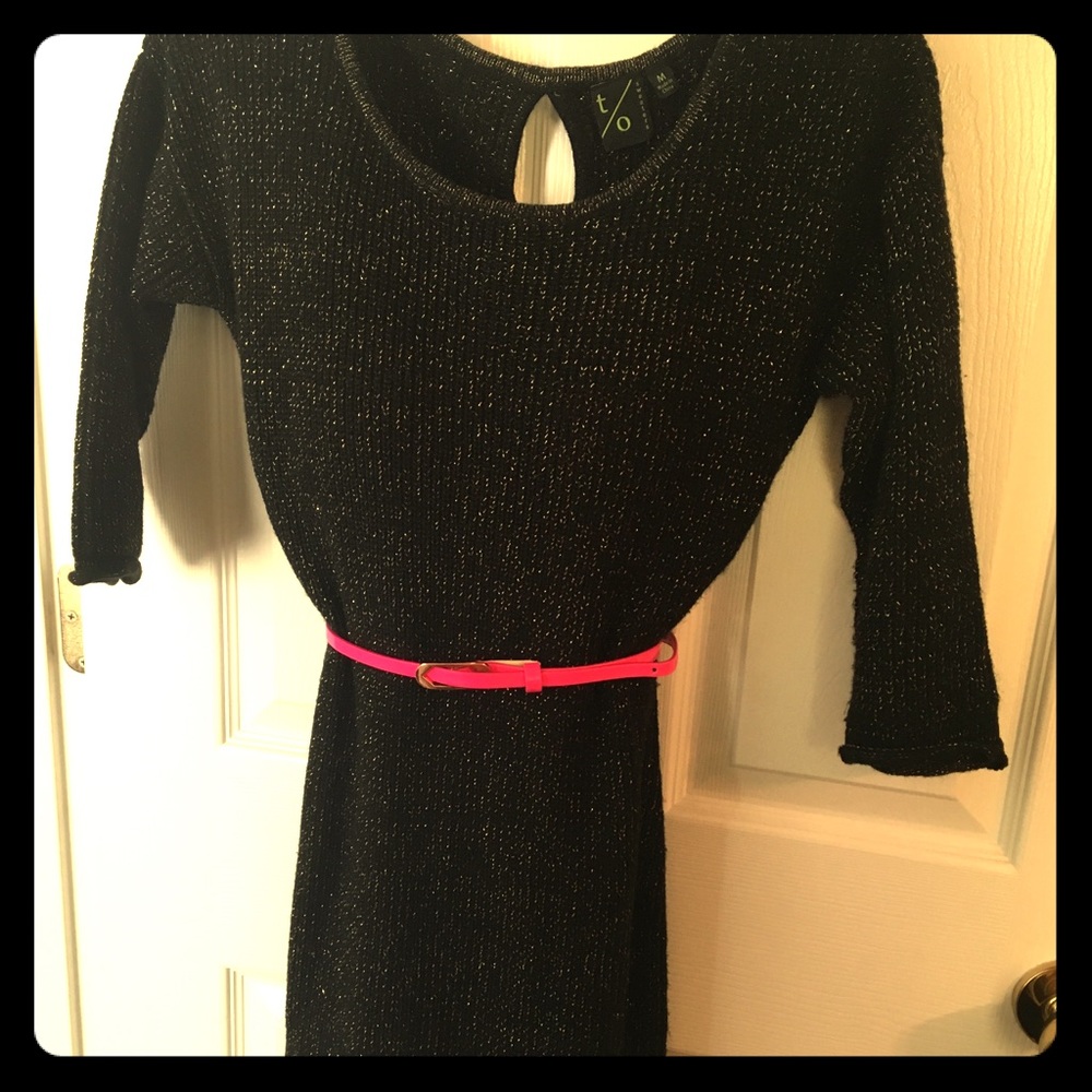 Black sparkly sweater dress with pink belt